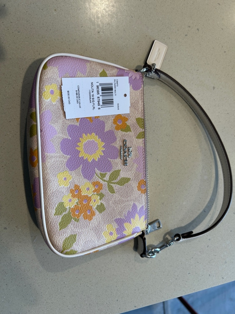 Coach Lavender Floral Mini Wristlet in Lavender Multi